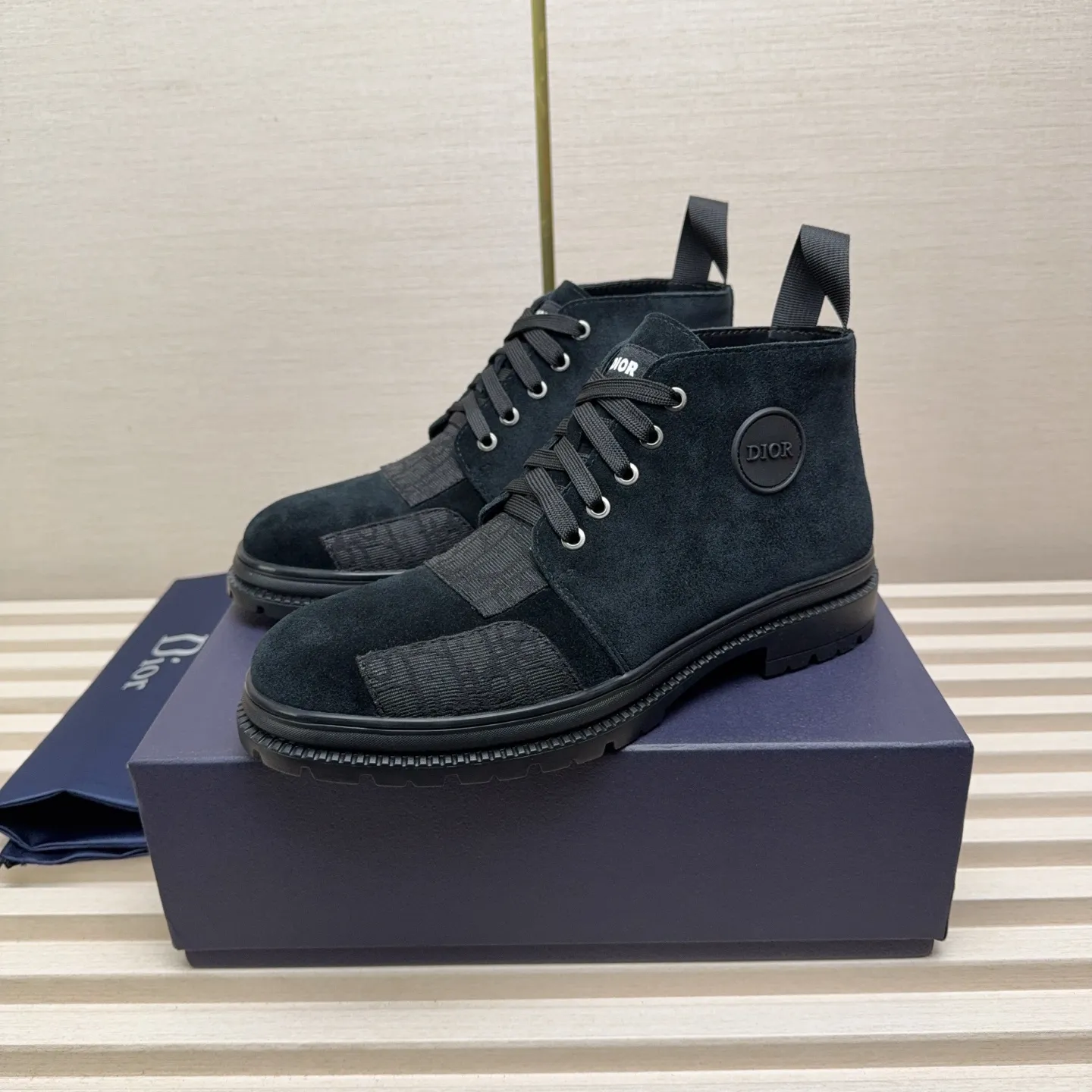 Men's Shoes 💰440 Dior A practical choice that combines protection with classic style. Made from durable Rugged Calf leather, it's tumbled and hand-finished to create a soft suede feel with a rich texture. Elastic side panels and subtle cutouts are inspired by the classic Chelsea boot. Leather upper and lining with Kummel tabs at front and rear, rubber outsole